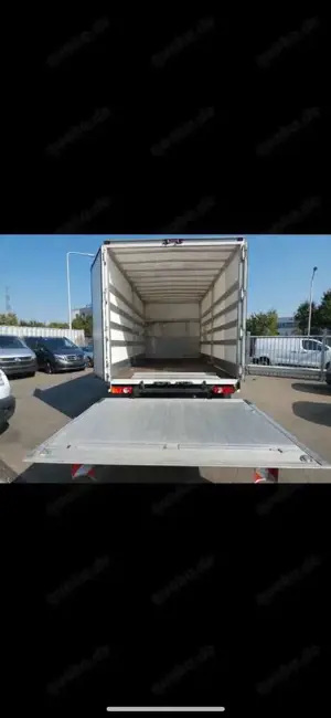 MAN TGE Plane mit Hehbebühne