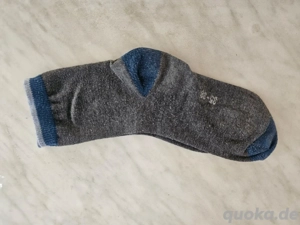 getragene socken 