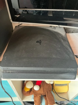 playstion 4 mit controller und spiel