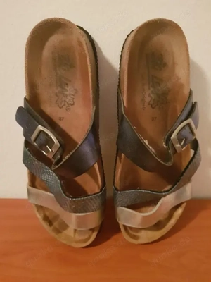 stark getragene Schuhe