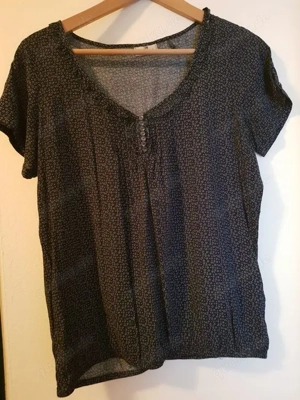 schickes getragens Oberteil