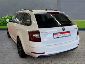 Skoda Octavia Combi Ambition 4x4 2.0 TDI+Navi+Parksensoren+LED Bild 2