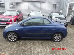 Nissan Micra Micra C+C 1.6 Premium*KLIMAAUTOMATIK*PGD*FOLIERUNG Bild 2