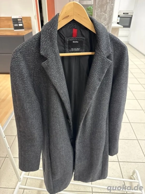 Mantel meliert Übergang