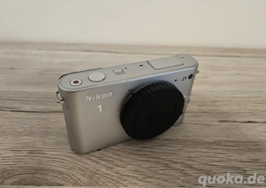 Nikon 1 J1 silber - Topzustand! Bild 3