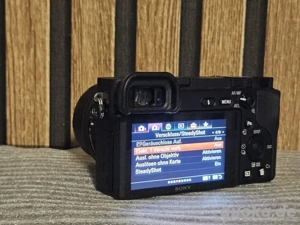 sony Alpha 6400- Schwarz original kit mit 2 opjektiven und verpakung + Zubehör set  Bild 3