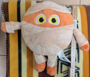 Kuscheltier   Plüschtier orangefarbene Mumienfigur aus der Serie "The Misfits"