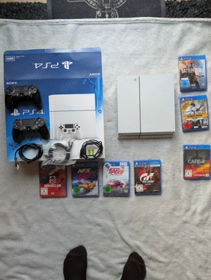 PS 4 Konsole & 7 Spiele