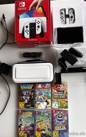 Nintendo Switch OLEDKonsole + Spiele + Tragetaschen Top Zustandverkaufe meine Nintendo Switch OLED (