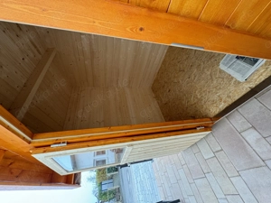Gartenhaus (Fichte) mit Holzlager im Blockhausstil   gegen Gebot
