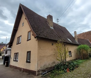 Einfamilienhaus mit Carport und Nebengebäuden
