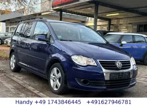 Volkswagen Touran 1.6i United/7-Sitzer/NAVI/SHZ/S-Heft/TÜV