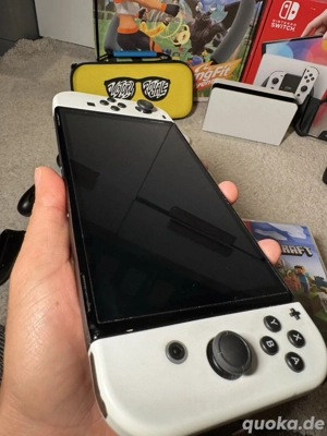 Nintendo Switch OLED Weiß Handheld Konsole mit 9 Spielen und Case OVP Neuwertig