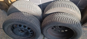 4 x Winterreifen Goodyear UG 9+ 205 55R16 91H auf 61 2J16 ET 46 Stahlfelgen 