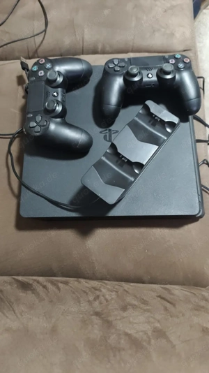 ps4  + 2 controller + ladestation +4 spiel 1tb