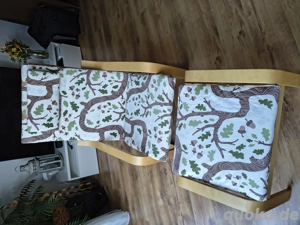 Ikea Schwing-Sessel und Hocker (Serie POÄNG)