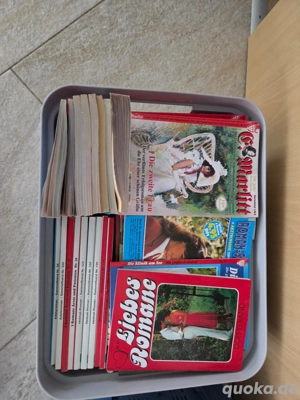 Kiste voller Romane abzugeben