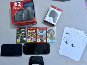 nintendo switch 2 spiele Konsole mit 4 videospiele und rechnung 