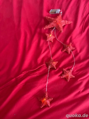 Verkaufe meinen gebrauchten, aber gut erhaltenen Leuchttüranhänger mit Sternenform