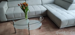 Glastisch oval mit Ablage 