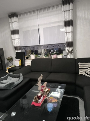 Gardinen mit passenden Raffrollos 