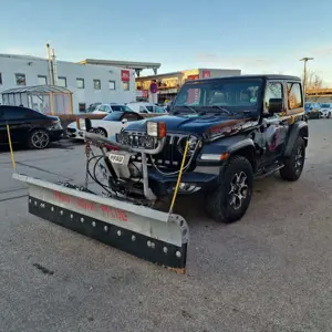 Jeep Wrangler Rubicon inkl. Schneepflug