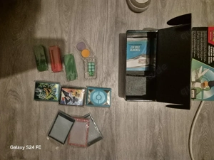 pokemon sleevs , kartenhalter ,münzen etc.