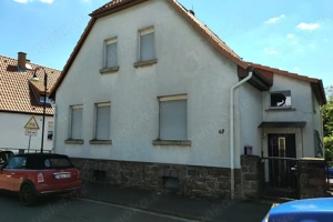 Einfamilienhaus freistehend mit Garage+Werkstatt naturnahen Garten