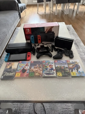 nintendo switch 1 spiel Konsole mit verpakung und 6 videospiel 