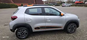 Dacia Spring Spring Comfort Plus - Orange Line