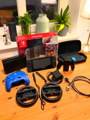 Nintendo switch 1 spielkonsole mit Verpakung und Mario kart 8 Deluxe und controller