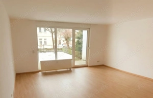 Moderne Single-Wohnung, sehr zentral und mit Garten