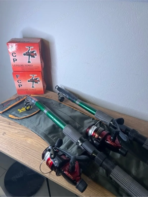 2  Teleskop-Brandungsruten mit Meeresrollen + Salmo-Tasche   NEU