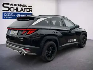 Hyundai TUCSON TUCSON 1.6 T-GDI Prime Hybrid 4WD Assi PanoDach Bild 4