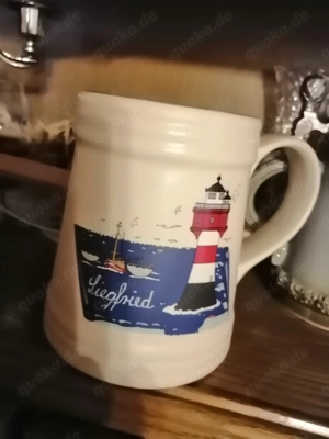 Siegfried Bierkrug azus dem Norden und Bayerischer Bierdeckel Holz