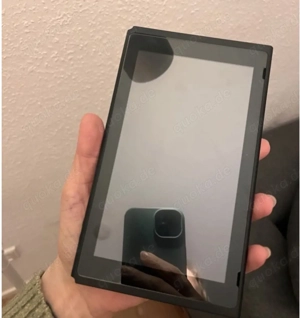 Nintendo Switch top Zustand plus 2 Controller 