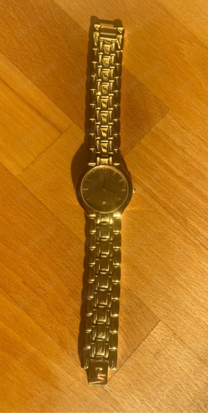 Goldfarbene TISSOT Herrenuhr Modell F273 Swiss Made