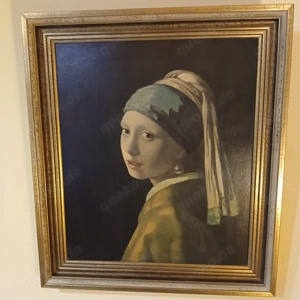 zwei schöne Gemälde  und ein kleiner Engel .