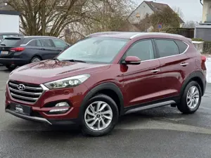 Hyundai TUCSON 1.6 Premium 4WD LEDER ROT+NAVI+KAM+STHZG Bild 2