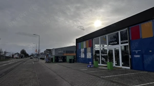 Vielseitig nutzbare Gewerbehalle   beheizt, große Tore, Einzelhandelsgenehmigung vorhanden