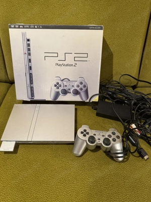 PlayStation 2 Silber mit Spielen und Verpackung 