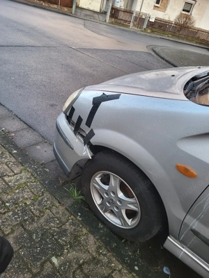 Nissan Almera tino  Bild 4