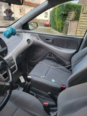 Nissan Almera tino  Bild 3