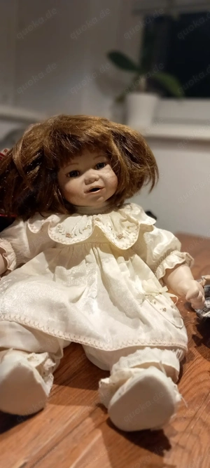 Puppen mit Porzellankopf. 