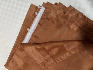 4 blickdichte Gardinen in Orange bzw. Rostfarben mit Blätter- und Geometrie-Dekor