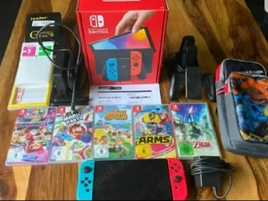 Nintendo Switch OLED-Modell, Inkl. 5 Spiele und Pikachu Tasche