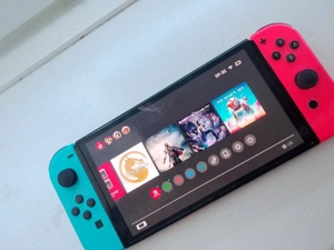 Nintendo Switch OLED inkl. 8 Spiele Bild 2
