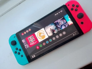 Nintendo Switch OLED inkl. 8 Spiele Bild 3