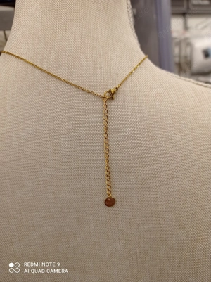 Frau Dekolleté 18 Karat Gold  Bild 3