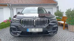 BMW X5 xDrive 30 d, mild-hybrid diesel,  Sport
